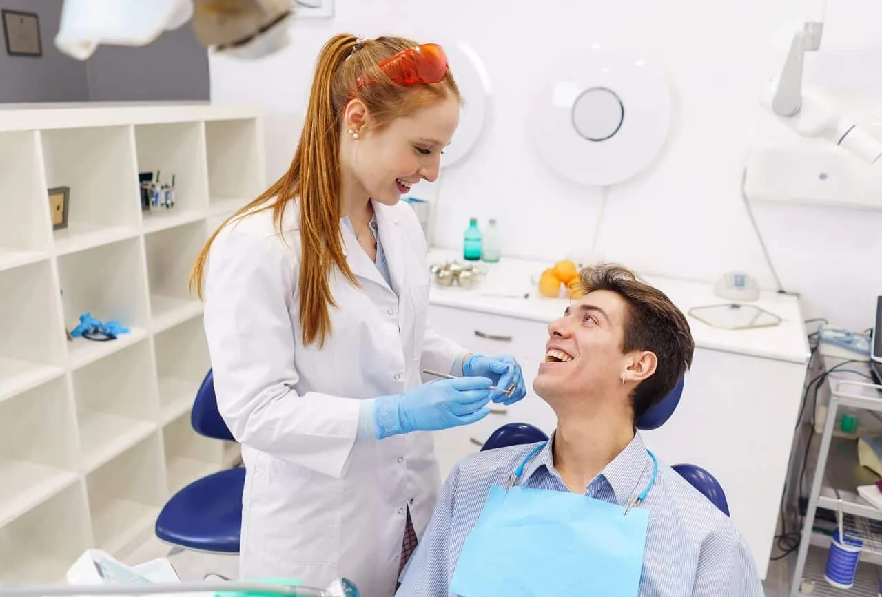 A Laguna Hills patient meeting with a dentist about implants